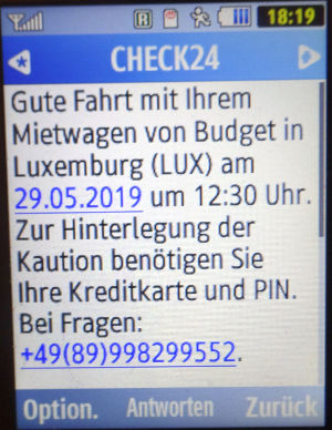 Budget®, Luxemburg, SMS von CHECK24 auf einem Samsung GT–C3590 Mobiltelefon