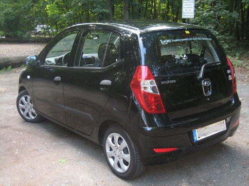 Hertz Mietwagen im August 2011 in Frankfurt am Main, Hyundai i10 1.1 Benziner, Heck und Seitenansicht