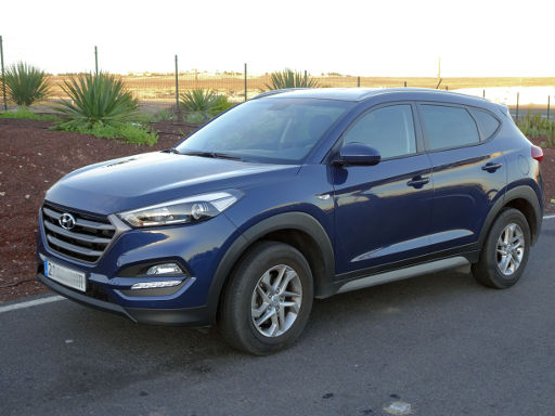 Hyundai Tucson Pure 1.6 GDI 97 kW, Ansicht von der Seite / vorne