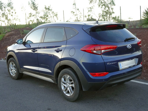 Hyundai Tucson Pure 1.6 GDI 97 kW, Ansicht von der Seite / hinten