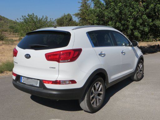 Kia Sportage 1.7 CRDi Diesel im September 2014, Ansicht von hinten / Seite