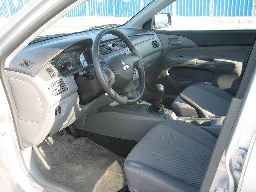 Dollar Rent A Car Mitsubishi Lancer GL 1300 Benziner, Innenraum Fahrersitz