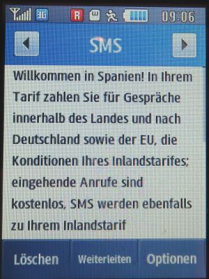 Blau, SMS auf einem Samsung GT–S3370 mit Meldung Willkommen in Spanien