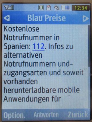 Blau, SMS auf einem Samsung GT–S3370 mit Meldung Notrufnummer 112 in Spanien März 2024