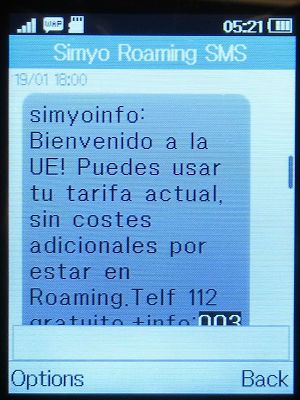 simyo prepaid SIM Karte Spanien, SMS Hinweis zum Roaming Tarif, Niederlande im Januar 2023 auf einem Alcatel 2051X