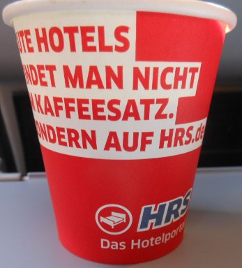 HRS Werbung 2012 auf einem Kaffeebecher bei airberlin