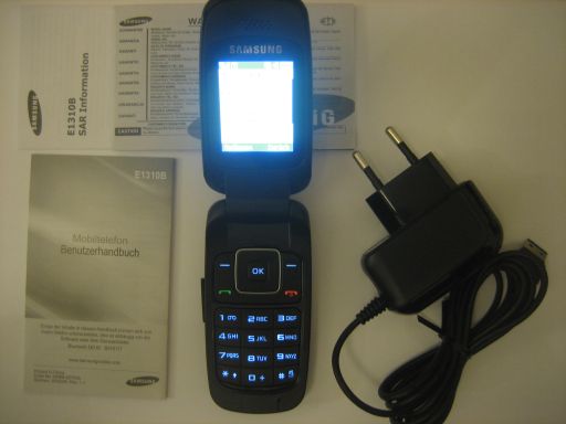 Samsung, Mobiltelefon, E1310B, Lieferumfang mit Garantiekarte, Bedienungsanleitung in deutsch, SAR Informationen und Netzteil