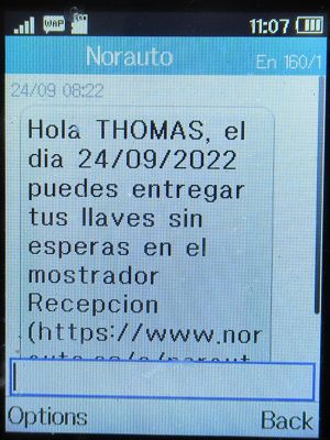 Norauto, Alcalá de Henares, Spanien, SMS um 8:22 Uhr mit Nachricht Fahrzeugabgabe auf einem Alcatel 2051X