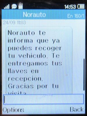 Norauto, Spanien, SMS um 11:03 Uhr mit Nachricht Fahrzeugabholung auf einem Alcatel 2051X