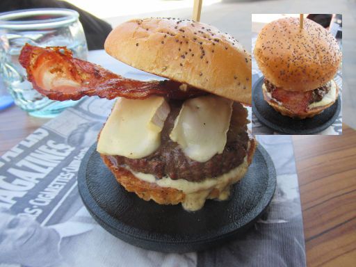 The Fitzgerald™, Alcalá de Henares, Spanien, Madame Burger mit 200 Gramm Rindfleisch, Brie Käse, karamellisierten Ziebeln, Bacon, hausgemachter Soße mit Honig und Senf