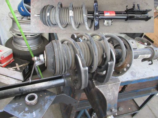 BriCar Boxes, Auto Mietwerkstatt, Fuenlabrada, Madrid, Spanien, Federspanner und Einbau neuer Sto&szlig;d&auml;mpfer