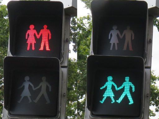 Ampel Fußgängersignal, Madrid, Spanien, Fußgängersignal mit einer Ampelfrau und einem Ampelmann in der Nähe der Metrostation O’Donnell im August 2017