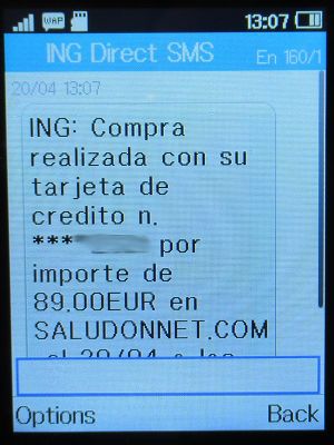 Centro Médico Cea Bermúdez, Madrid, Spanien, ING Direct SMS auf einem Alcatel 2051X Mobiltelefon