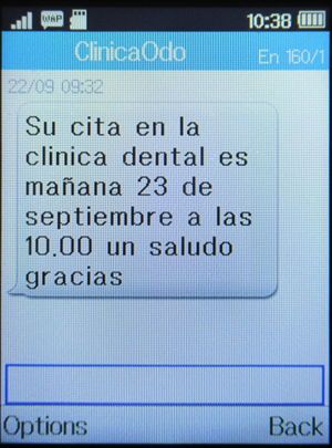 Clínica Odontológica de Postgrados Universitarios, Zahnarztpraxis, Madrid, Spanien, SMS Termin Erinnerung auf einem Alcatel 2051X