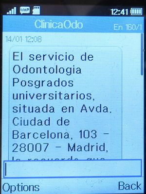 Clínica Odontológica de Postgrados Universitarios, Zahnarztpraxis, Madrid, Spanien, SMS Info Termin Januar 2021 auf einem Alcatel 2051X