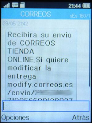 Correos, Madrid, Spanien, SMS mit Versandhinweis auf einem Alcatel 2051X