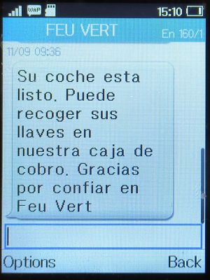 Feu Vert, Madrid, Spanien, Feu Vert SMS mit Nachricht Fahrzeug bereit zur Abholung auf einem Alcatel 2051X