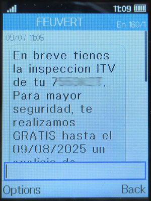 Feu Vert, Madrid, Spanien, Feu Vert SMS mit Hinweis ITV (TÜV) im Juli 2025 auf einem Alcatel 2051X