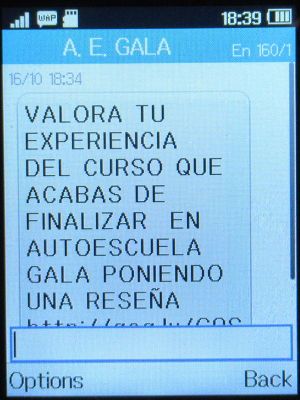 GALA Autoescuela, ADR Cisternas, Madrid, Spanien, SMS auf einem Alcatel 2051X mit der Einladung den Kurs zu bewerten