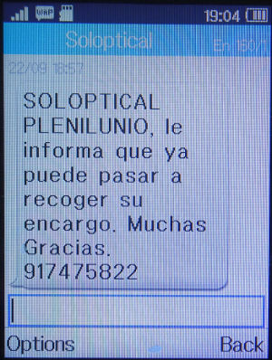 Soloptical®, Madrid, Spanien, Abholmitteilung per SMS auf einem Alcatel 2051X