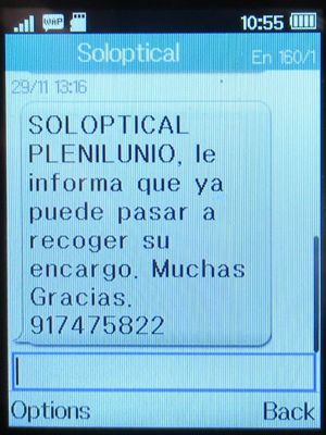 Soloptical®, Madrid, Spanien, Abholmitteilung per SMS auf einem Alcatel 2051X