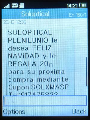 Soloptical®, Madrid, Spanien, Weihnachten 2023 SMS auf einem Alcatel 2051X