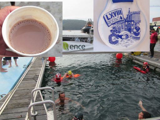 LXVIII Decenso a nado R&iacute;a Navia, 2026 Schwimmwettbewerb, Navia, Spanien, Ziel im Hafen, hei&szlig;e Schokolade und Medaille
