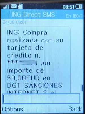 Strafzettel Bußgeldbescheid, DGT, Spanien, SMS Zahlungsbestätigung der ING Bank auf einem Alcatel 2051X Mobiltelefon