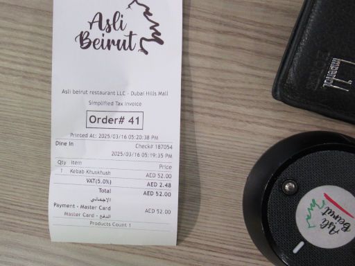 Asli Beirut Restaurant, Dubai, Vereinigte Arabische Emirate, Quittung und Signalisierungsger&auml;t Bestellung abholbereit